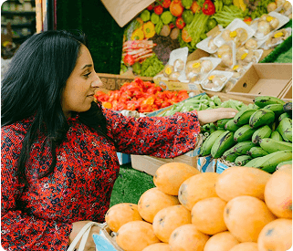 woman looking fruits